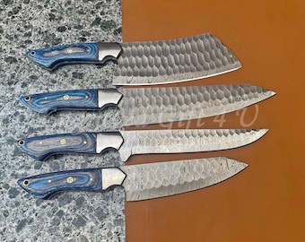May include: A set of five kitchen knives with textured steel blades and blue and gray wooden handles. The blades have a unique pattern, and the handles are a mix of blue and gray wood with silver bolsters.