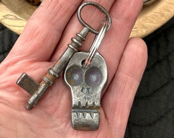 hand forged skull keychain.