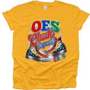 May include: Yellow t-shirt with a graphic of two colorful Converse sneakers with the text "OES Chucks & pearls 2024"