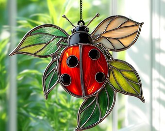 葉っぱの上のてんとう虫の見事なフェイクステンドグラスサン