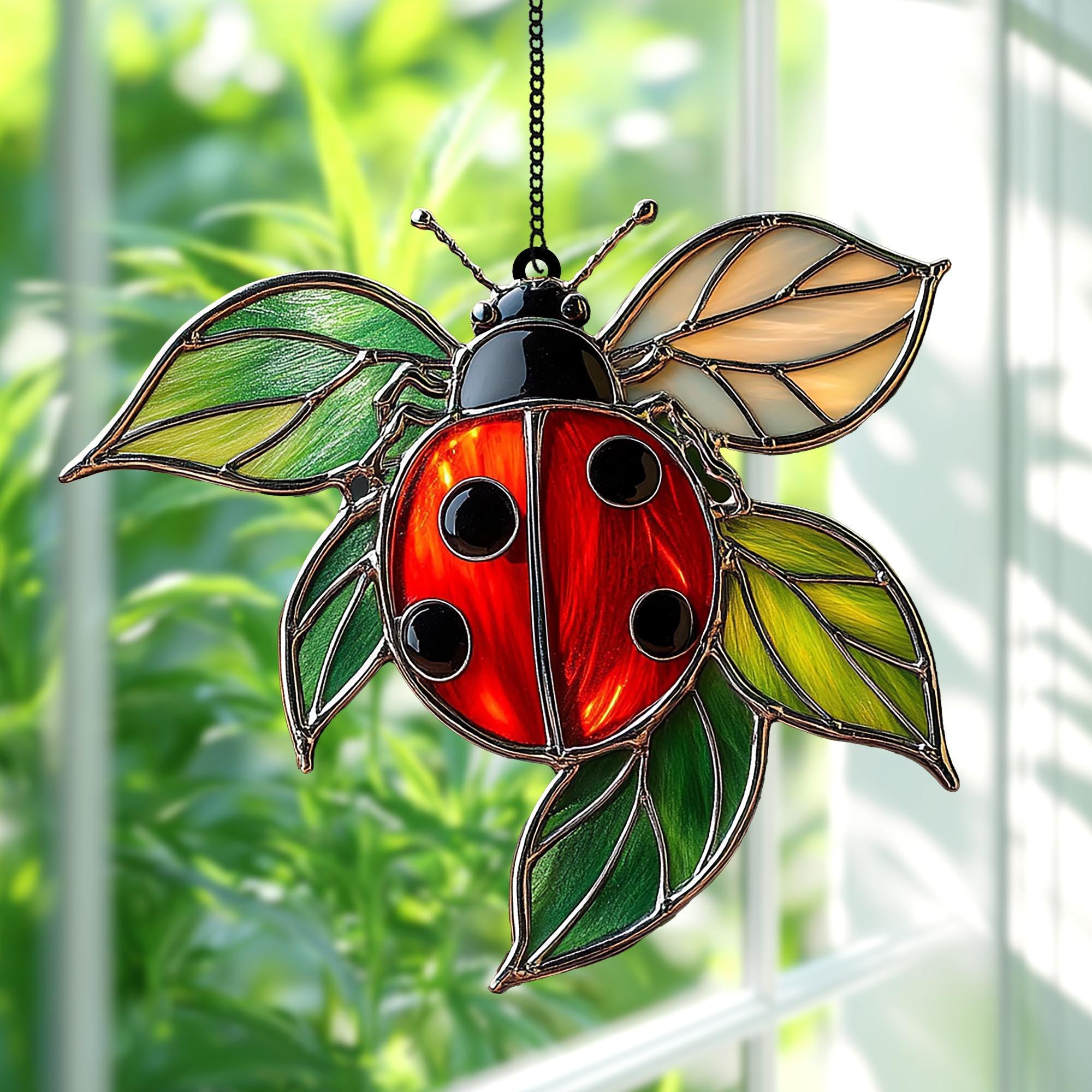 葉っぱの上のてんとう虫の見事なフェイクステンドグラスサン