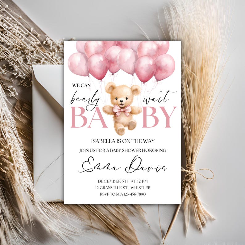 May include: A pink and white baby shower invitation with a teddy bear holding pink balloons. The text reads "We can bearly wait BABY" and "Isabella is on the way".