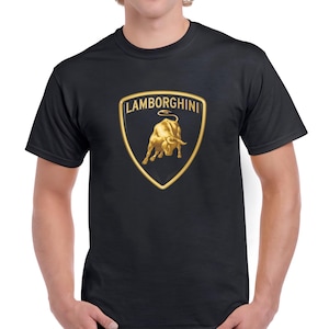 May include: Black t-shirt with a gold Lamborghini logo featuring a charging bull and the text "Lamborghini".