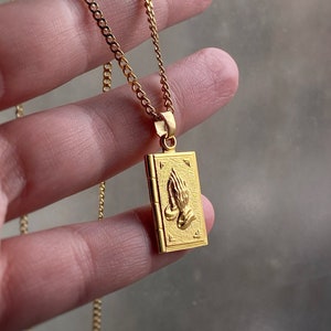 Gold chain with god locket discount