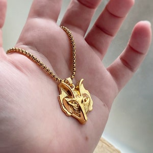 Wolf Charm Pendant Necklace comes with or without custom length chain, gold or rhodium (silver) plated