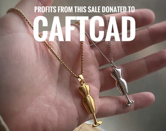 Judy Mannequin Charm Pendant w/ or w/out custom chain in Gold or Rhodium Plated. Profits from sales of this necklace go to CAFTCAD.