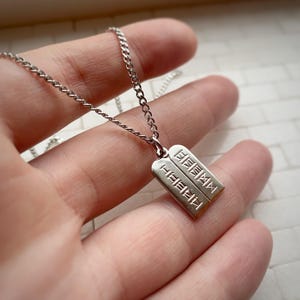 Ten Commandments Charm in Gold or Rhodium comes with or without a chain, and a velvet gift bag, made in the US and Canada