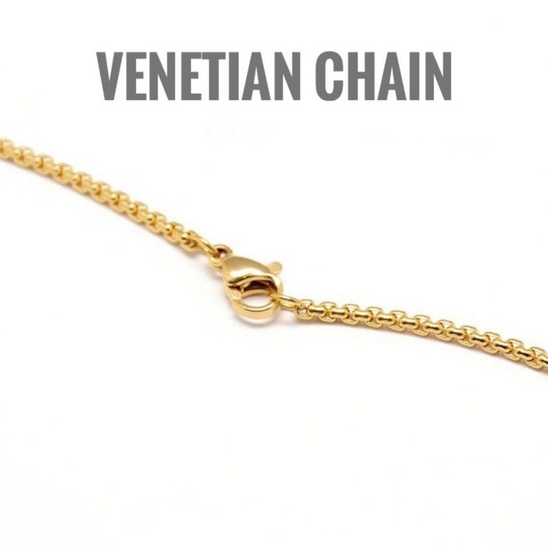 May include: A gold Venetian chain necklace with a lobster clasp closure.