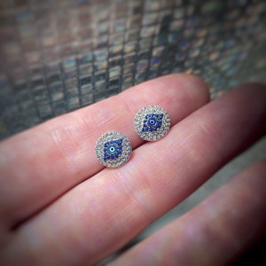 Sterling Silver Evil Eye Stud Earrings with clear and blue cubic zirconia and enamel and rhodium plating