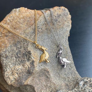 Pelican Charm Pendant Necklace w/ long lasting 18k gold plating, pendant only available, charm options, gift bag. Cross culture symbolism