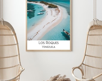 May include: A framed photograph of a tropical island with white sand and turquoise water. The image shows several boats anchored near the shore. The text "Los Roques, Venezuela" is printed below the image.