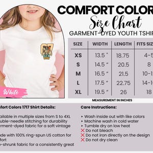 May include: A white Comfort Colors youth t-shirt with a small graphic on the front. The image includes a size chart with measurements in inches and care instructions. The shirt features a graphic of a skeleton wearing sunglasses and the text "SIX SEVEN".