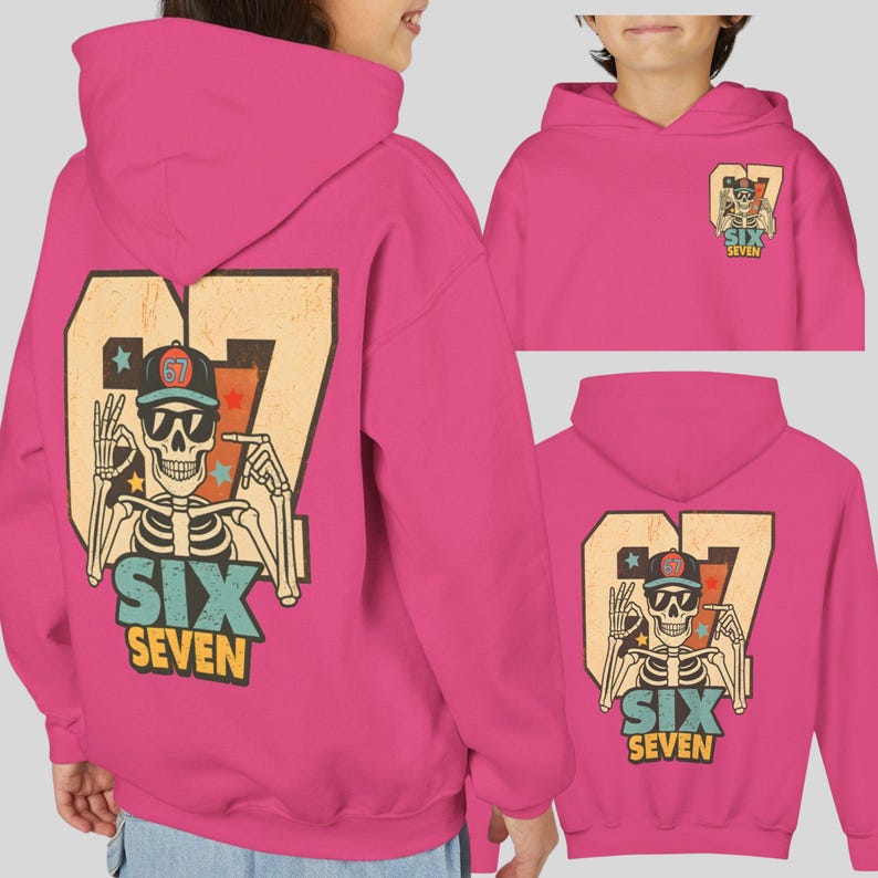 May include: Hot pink hoodie with a graphic of a skeleton wearing sunglasses and a baseball cap, with the number 67 and the words "SIX SEVEN". The design is on the back and small on the front.
