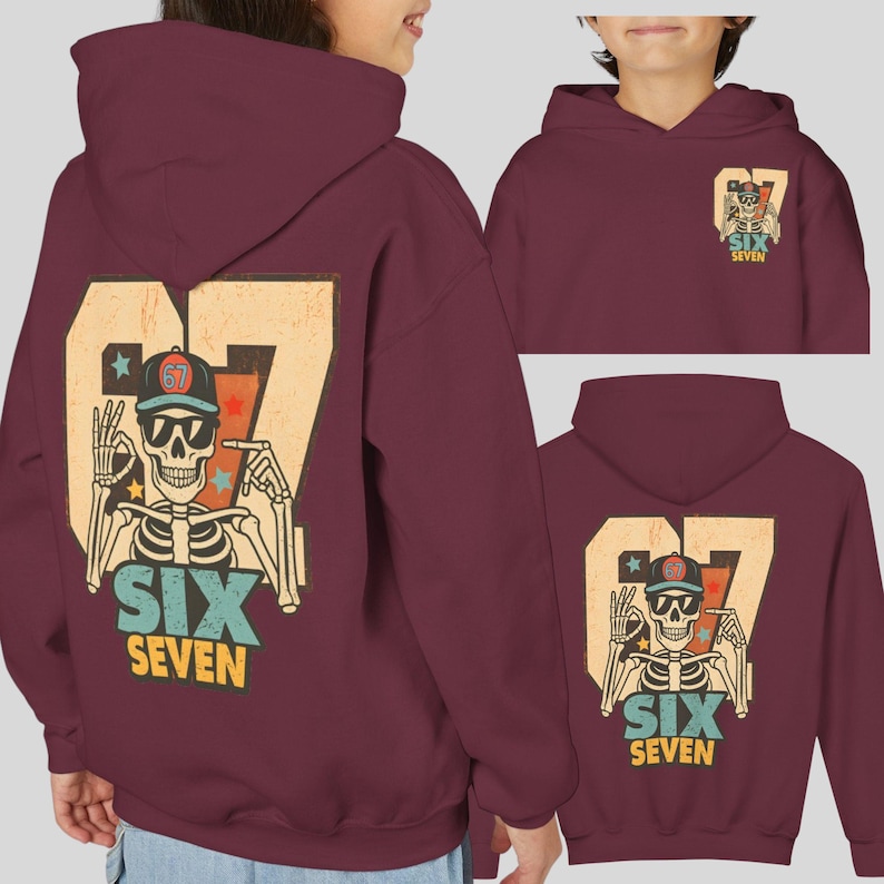 May include: Burgundy hoodie featuring a skeleton graphic wearing sunglasses and a baseball cap, with the number "67" and the words "SIX SEVEN". The design includes stars and a retro style.