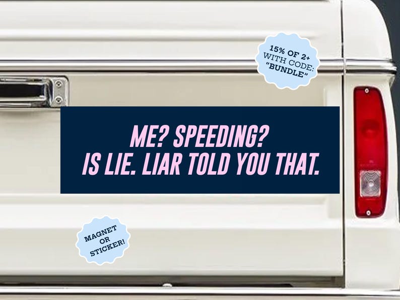 May include: A rectangular bumper sticker or magnet with a dark blue background and light pink text that reads: ME? SPEEDING? IS LIE. LIAR TOLD YOU THAT. The product is displayed on the white tailgate of a vehicle, featuring a light blue circular badge.