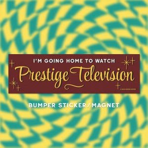 May include: A rectangular bumper sticker or magnet with the text "I'M GOING HOME TO WATCH Prestige Television" in a retro font. The background is a repeating pattern of yellow and teal diamonds.