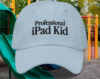 May include: A light blue baseball cap with the text "Professional iPad Kid" embroidered in black.