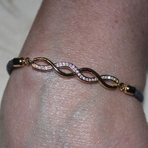 Micro Pave, Cubic Zirconia, Minimalist Style, Adjustable Bracelet. Double Infinity Connector. Dark Grey, Nylon Cord. Sparkling,and Stylish.