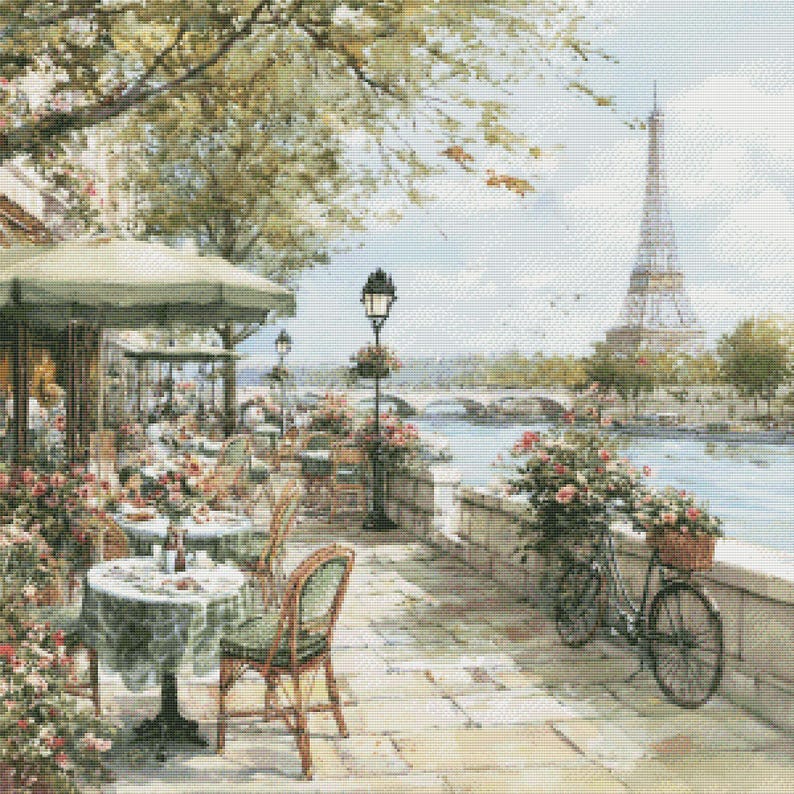 May include: A detailed painting of a Parisian cafe scene. Tables with green tablecloths and chairs are set up on a stone patio. The Eiffel Tower is visible in the background, along with a bicycle with a basket of flowers.