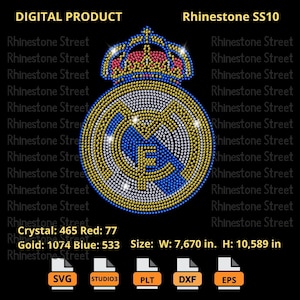 May include: A rhinestone design of a football team logo with a crown on top. The logo is blue, white, and gold. The design is 7.67 inches wide and 10.589 inches tall. The design is made up of 465 clear rhinestones, 77 red rhinestones, 1074 gold rhinestones, and 533 blue rhinestones.