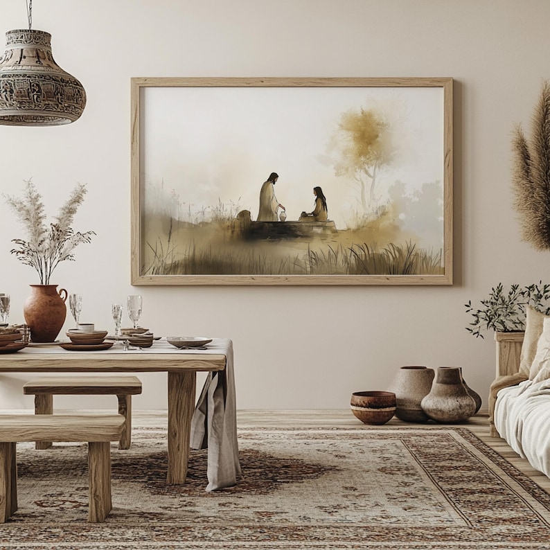 May include: A watercolor painting in a wooden frame depicts two figures, a man and a woman, interacting by a well in a landscape setting. The painting has a muted color palette with shades of brown, beige, and gray.