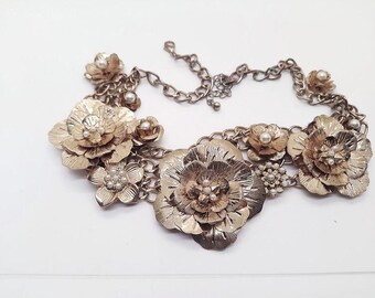 Vintage hergebruikte ketting uit de jaren 80, gouden bloemen.