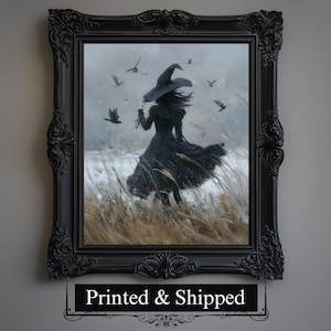 May include: A framed print depicts a figure in a black dress and hat, walking through a field with birds in the sky. The artwork is set in a black ornate frame. The text "Printed & Shipped" is at the bottom of the frame.