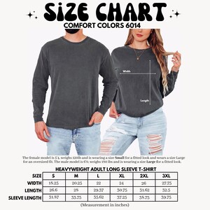Pode incluir: Tabela de tamanhos para uma camiseta de manga comprida de peso pesado. A tabela mostra as medidas em polegadas para os tamanhos S, M, L, XL, 2XL e 3XL. As medidas incluem a largura, o comprimento e o comprimento da manga.