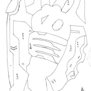 May include: A black and white hand-drawn template for a helmet or mask, with geometric shapes and cutouts. Measurements are in millimetres, including 5 mm and 10 mm. The text "DLP Props" is in the bottom right corner.