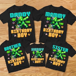 May include: Black t-shirts with birthday-themed graphics. The shirts feature text like "Daddy of the Birthday Boy," "Mammy of the Birthday Boy," and "Brother of the Birthday Boy." A shirt says "Harry 6 Birthday Boy."
