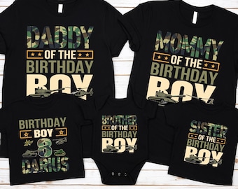 May include: Black t-shirts and a onesie with military-themed designs. The shirts read "Daddy," "Mommy," "Brother," and "Sister" with "of the Birthday Boy." One shirt says "Birthday Boy" with the number 8 and the name "Darius."