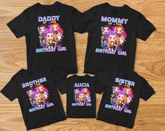 May include: Black t-shirts with colorful graphics and text for a birthday celebration. The shirts read "Daddy of the Birthday Girl," "Mommy of the Birthday Girl," "Brother of the Birthday Girl," "Sister of the Birthday Girl," and "Alicia of the Birthday Girl."