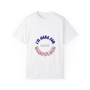 May include: White t-shirt with a blue and red circle graphic that says "I'm here for Karlie Samuelson".