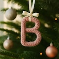 Custom Knitted Wire Letter for Christmas Tree: Soft Cotton Initial Ornament product logo