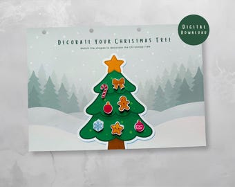 May include: A Christmas-themed activity sheet with a green Christmas tree and various colorful ornaments. The text "Decorate Your Christmas Tree" is displayed above the tree. A digital download sticker is in the upper right corner.