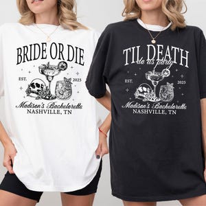 Peut inclure: Deux t-shirts blancs avec du texte et des graphismes noirs. Le texte sur le t-shirt de gauche est "Bride or Die" avec un cr&acirc;ne et des os crois&eacute;s et un verre &agrave; cocktail. Le texte sur le t-shirt de droite est "Til Death Do Us Party" avec un cr&acirc;ne et des os crois&eacute;s et un verre &agrave; cocktail. Les deux t-shirts portent le texte "Madison's Bachelorette Nashville, TN" et l'ann&eacute;e "2025".