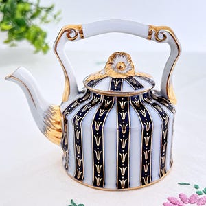 Tiny novelty teapot, a charming little miniature vintage collectable by Regal Porcelain from the 1970s
