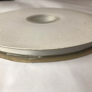 100 yard Spool of 1/4” Light Silver Single Face Satin Ribbon