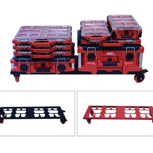May include: A black metal rolling dolly platform with four red caster wheels, shown supporting a stack of red and black Milwaukee tool storage cases. Two additional inset images display the dolly frame in solid black and solid red colour options.