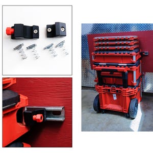 May include: A set of black mounting brackets with orange knobs and metal springs, shown alongside a stack of red and black modular tool storage cases. The brackets are designed to secure the tool cases to a red vertical mounting surface.
