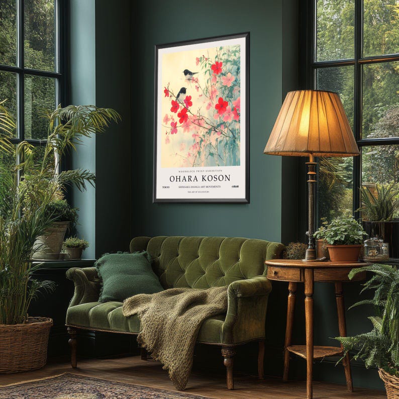 May include: A framed print of a Japanese painting featuring two black birds perched on a branch of pink blossoms. The print is titled "Ohara Koson" and is from the "Japanese Woodblock Art Movement".