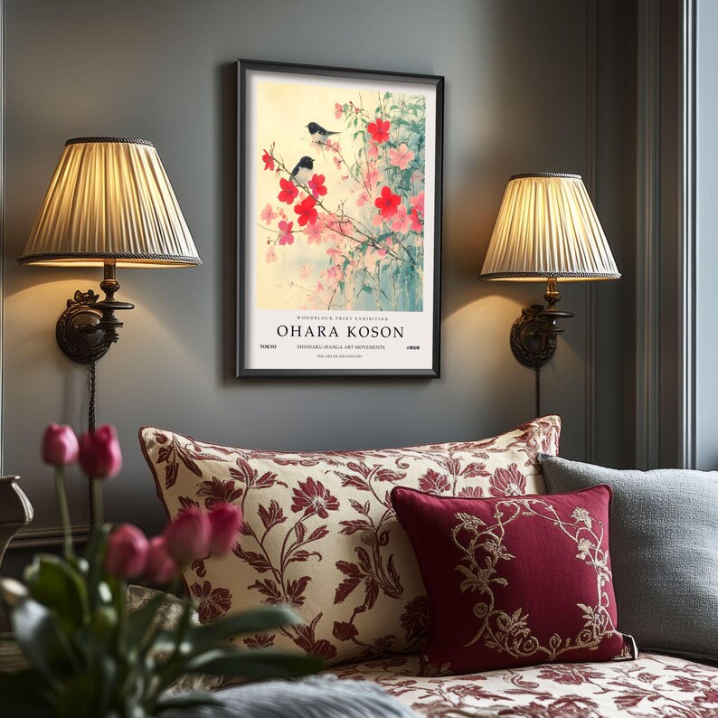 May include: A framed print of a Japanese painting featuring two black birds perched on a branch of a flowering tree with pink and red blossoms. The print is titled "Ohara Koson" and is from the "Woodblock Print Exhibition" at the "Shiseido Gallery Art Movements".