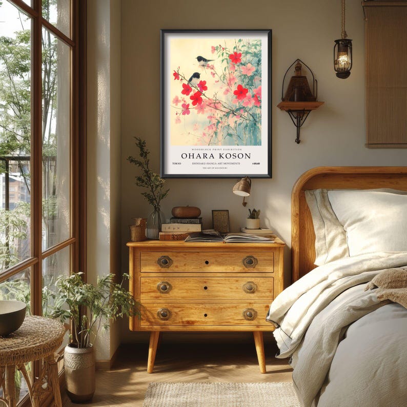 May include: A framed print of a Japanese painting featuring a branch of pink blossoms with two black birds perched on the branches. The print is titled "Ohara Koson" and is from the "Birds and Flowers" collection.