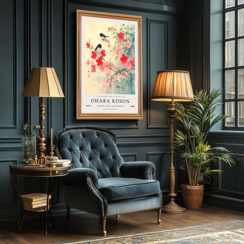 May include: A framed print of a painting depicting two black and white birds perched on a branch of a flowering tree with pink blossoms. The print is titled "OHARA KOSON" and is from the "Woodblock Print Exhibition" at the "International Gallery of Modern Art".