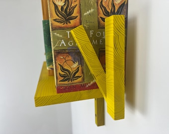 BOOKENDS book shelf with adjustable ends to support your reads. Inventive and useful design hand crafted in pine