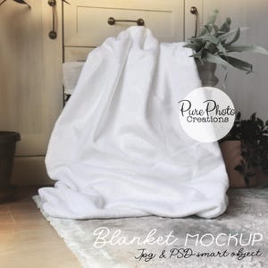 May include: White blanket mockup with a text overlay that says "Blanket MOCKUP Jpg & PSD smart object" and a watermark that says "Pure Photo Creations".