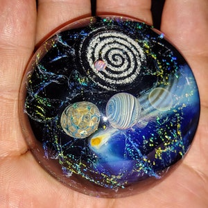 memorial glass remembrance ash planet space paperweight with opal 2 inch across with opal handmade for you by Joe Crisanti
