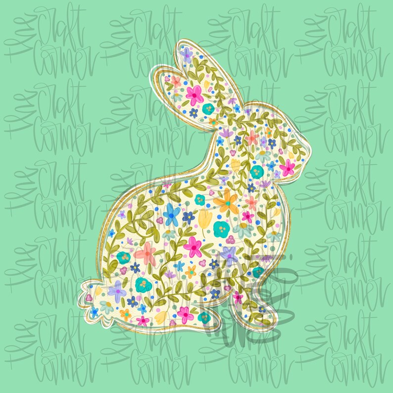 May include: A floral bunny design with a gold outline, filled with colorful flowers and green leaves. The bunny is set against a light green background with the words "Craft Corner" repeated in a pattern.