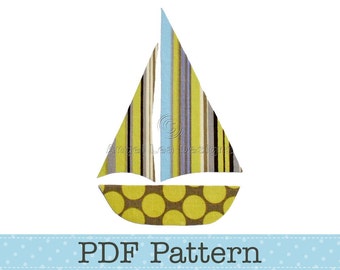 May include: A PDF pattern for a sailboat applique. The sailboat is made of yellow, blue, and brown striped fabric with a yellow polka dot sail.