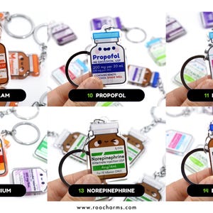 May include: Keychains featuring cartoon-style medicine bottles with various drug names like Midazolam, Propofol, and Lorazepam. Each keychain has a black ring and a smiling face on the bottle. The text "www.roocharms.com" is visible.